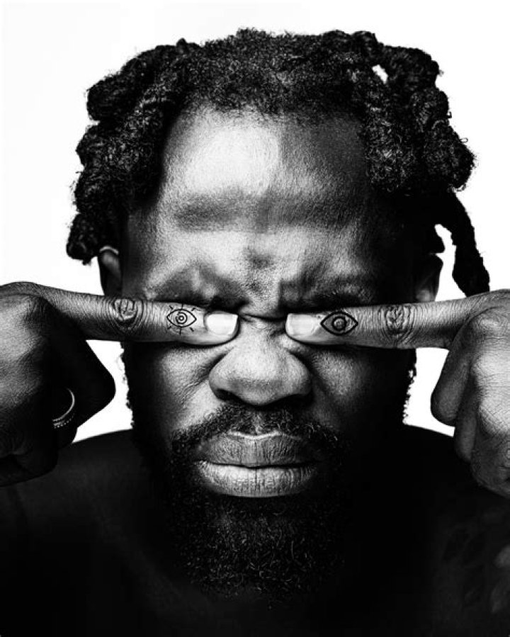 Unbothered Fameye Flaunts New Tattoo Of Son Amidst Curses From Ogidi Brown